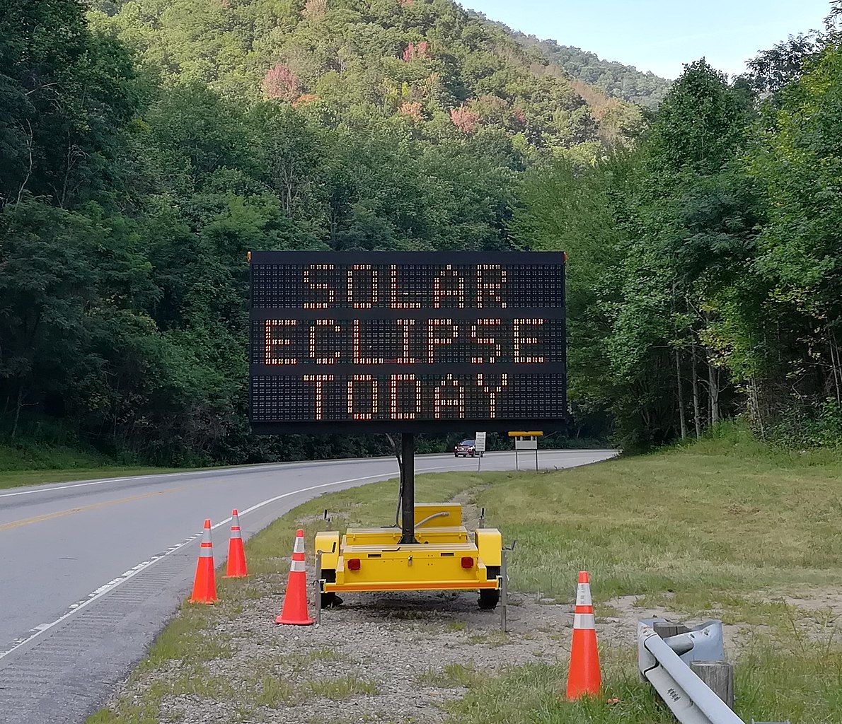 Solar eclipse warning road sign